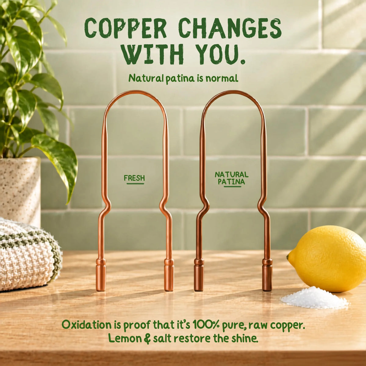 Two copper tongue scrapers with a natural patina finish, displayed on a wooden countertop with a lemon, salt, and plant in a kitchen setting. Text overlays explain that the copper changes with you and that lemon and salt restore the shine.